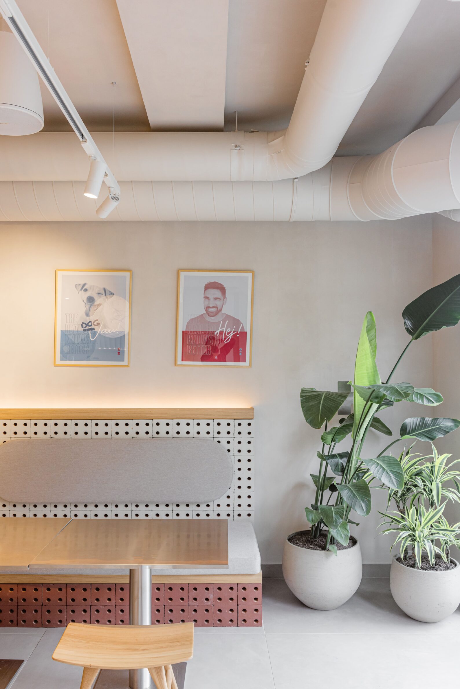 Restaurant MIG by Studio Fluid with an open counter connecting food preparation and dining in Belgrade, Serbia