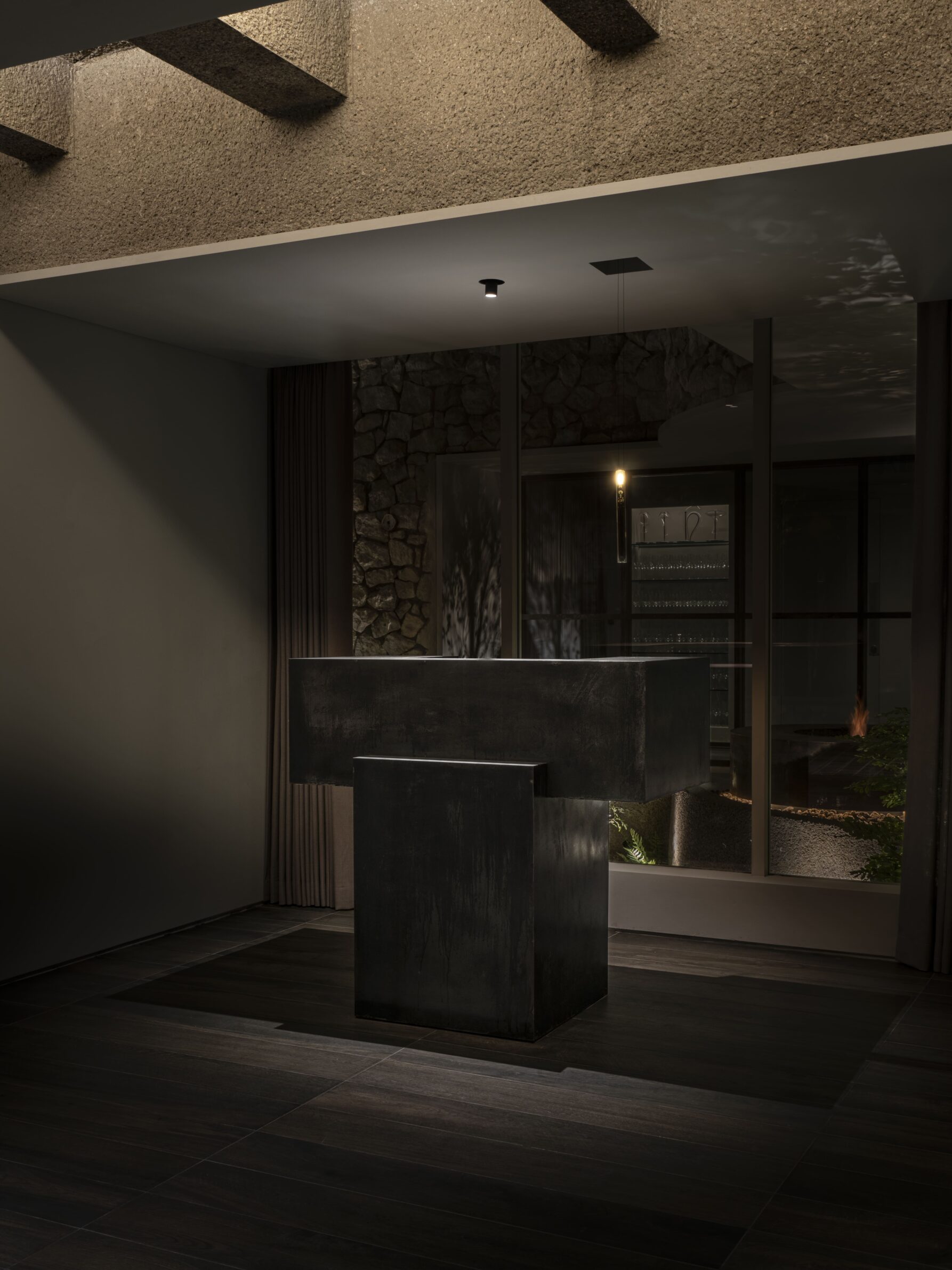 Imok Smoke Dining by Project Mark with dark concrete interiors, controlled lighting and fire elements in Seoul, South Korea