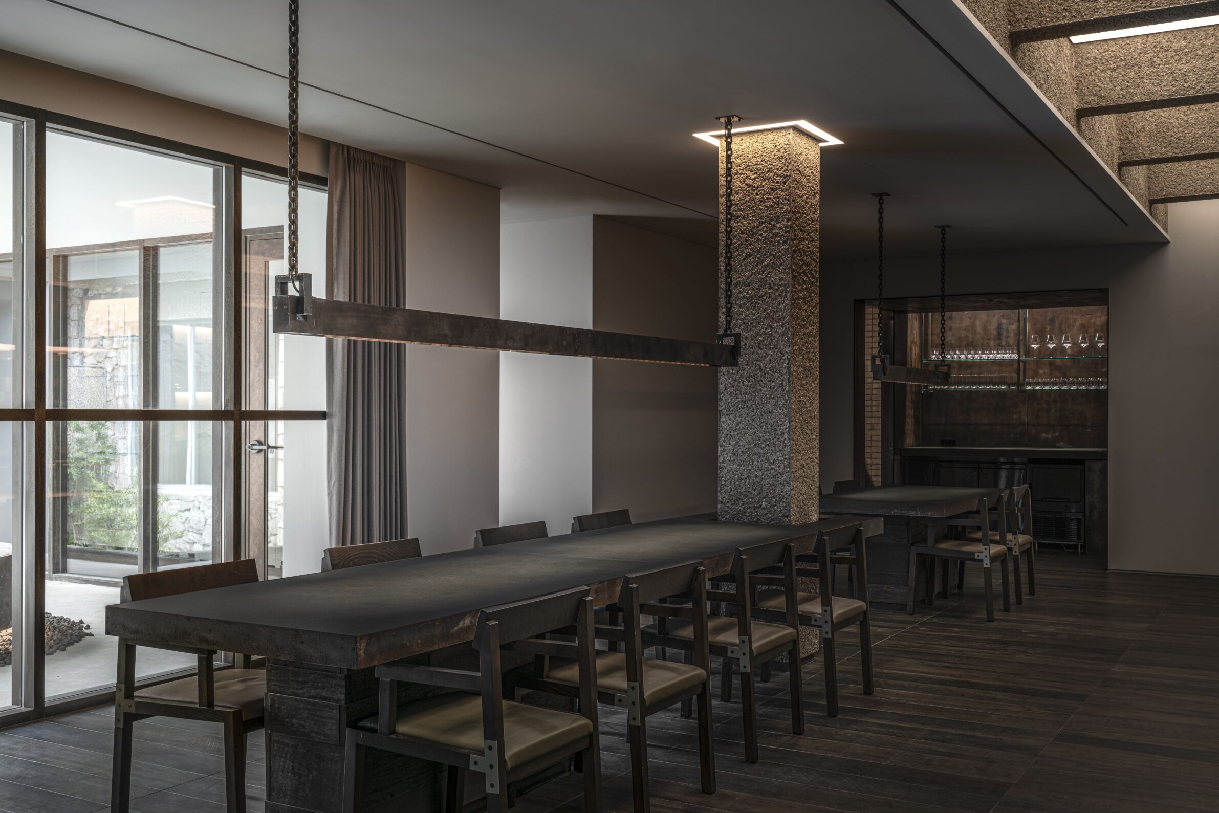 Imok Smoke Dining by Project Mark with dark concrete interiors, controlled lighting and fire elements in Seoul, South Korea