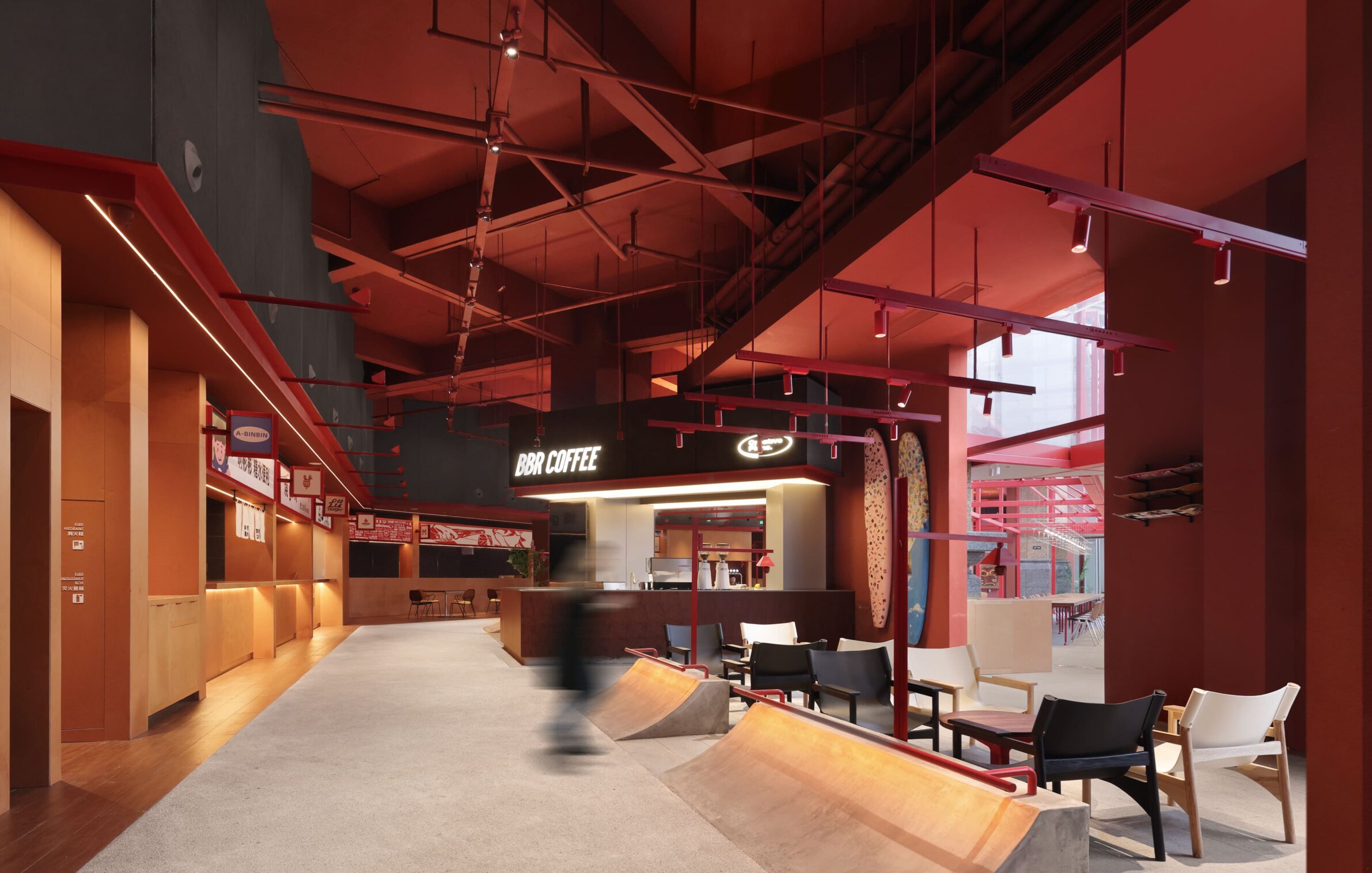 MEET&EAT Hengyang Store by LEL DESIGN STUDIO with a red steel framework connecting the restaurant to the street